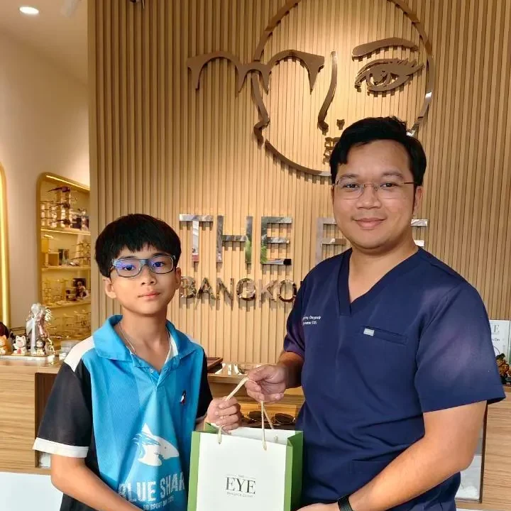 child-myopia-glasses-handover